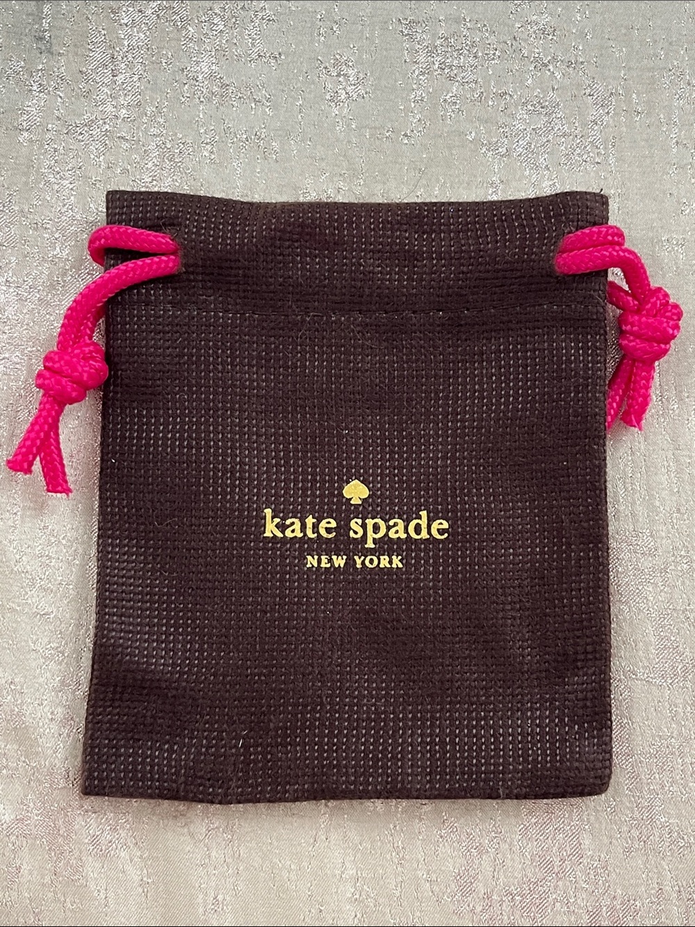 kate spade Brown Jewelry Pouch with Hot Pink Drawstrings